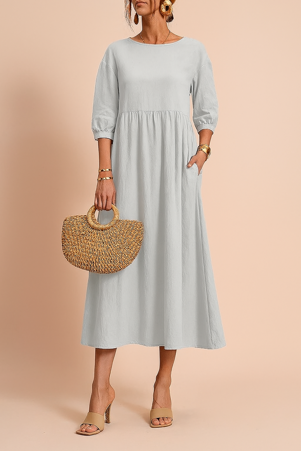 Comfortable and elegant women's midi dress. Features 3/4 sleeves for versatile everyday and office fashion.