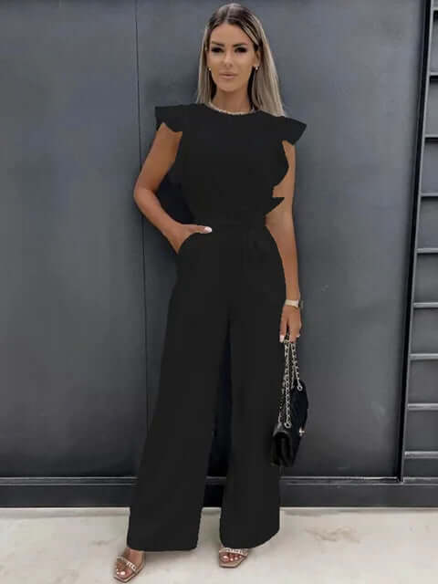Elegant women's black wide-leg jumpsuit with chic ruffled sleeves. Perfect for stylish occasions & comfortable wear.