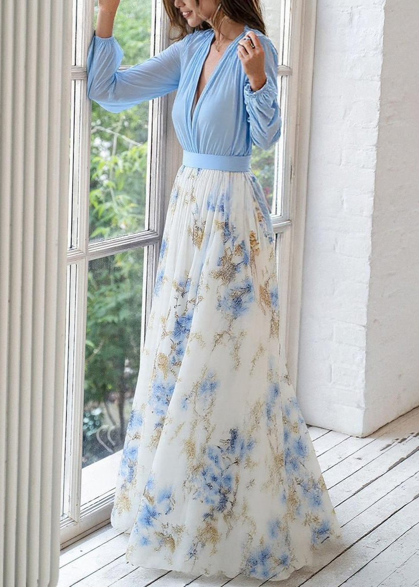 Elegant women's blue floral V-neck maxi dress with flowy chiffon, perfect for summer parties & formal events.