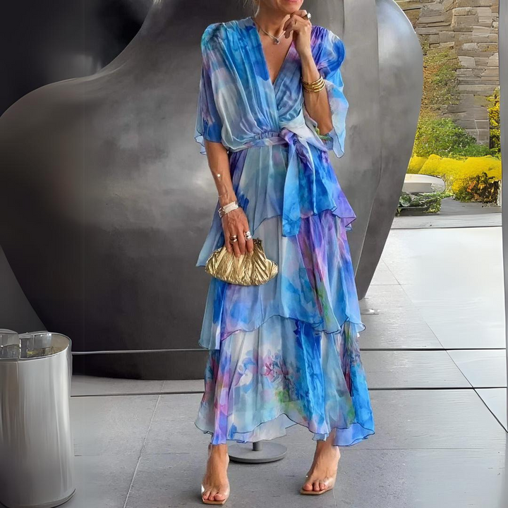 Elegant women's blue V-neck dress, flattering flowy silhouette, perfect for summer parties & chic events.