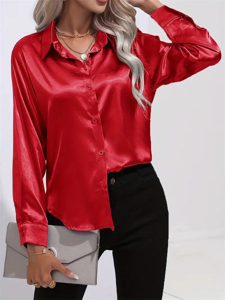Chic women's long-sleeve button-down top, versatile for all seasons.