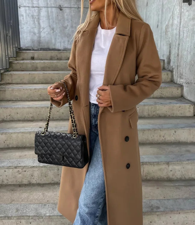 Close-up of the women's classic trench coat fabric, emphasizing its quality and stylish outerwear finish.