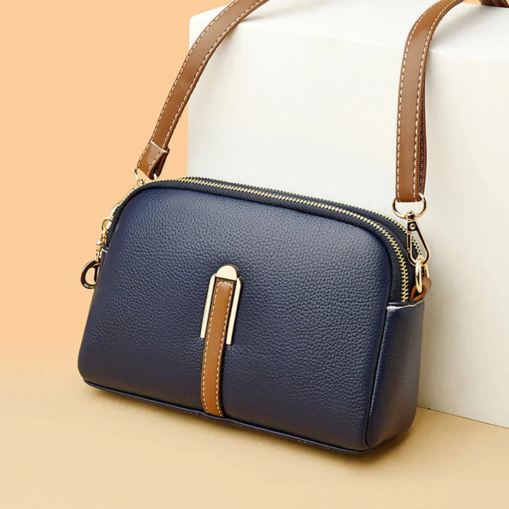 Chic faux leather women's handbag, an elegant fashion accessory for versatile styling.