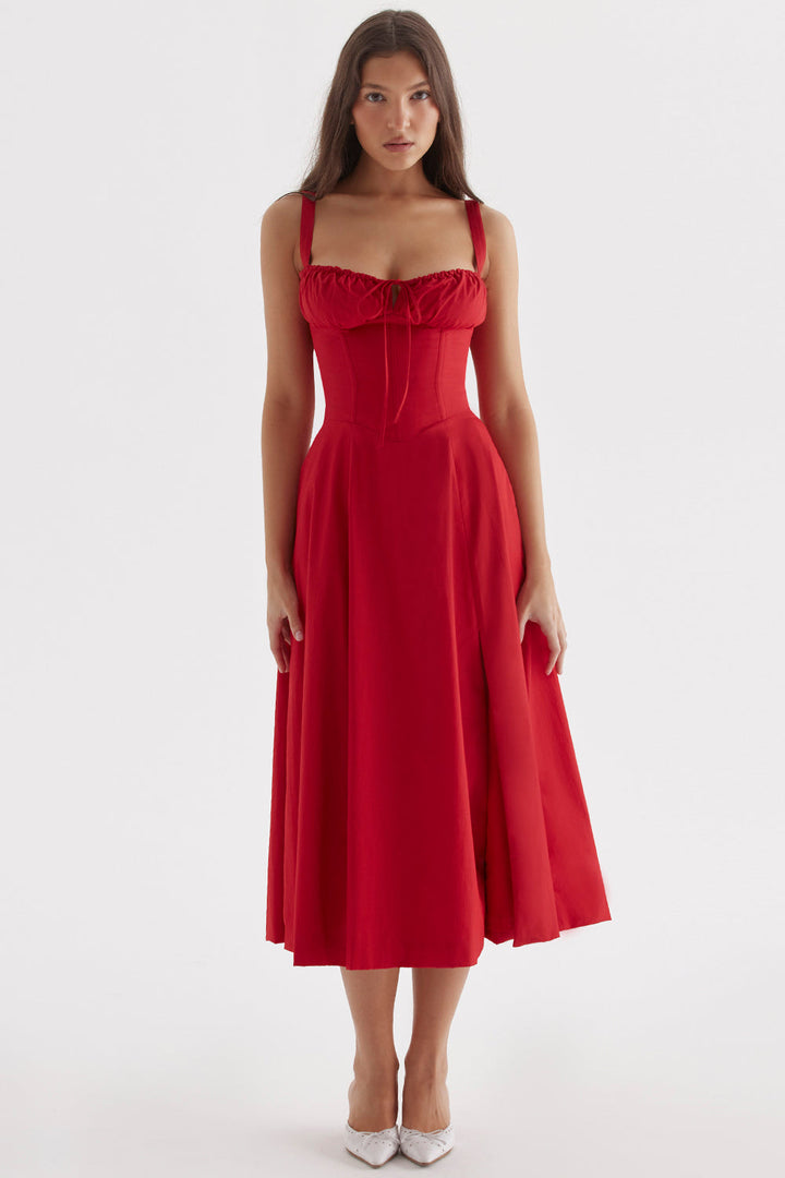 Sophisticated women's floral bustier dress, ideal for summer events, with elegant waist-shaping details.
