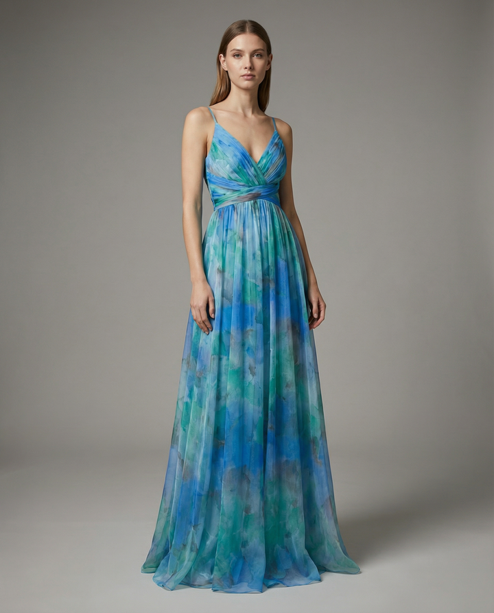 Eye-catching floral evening maxi dress, a fashionable women's party or special occasion gown.