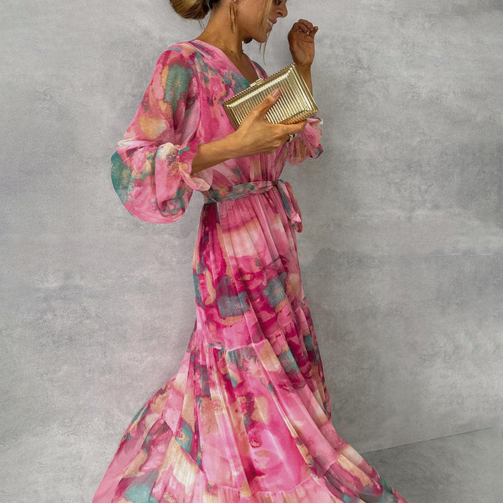 Fashionable women's long sleeve floral wrap maxi dress. Versatile elegant dress suitable for summer casual & parties.