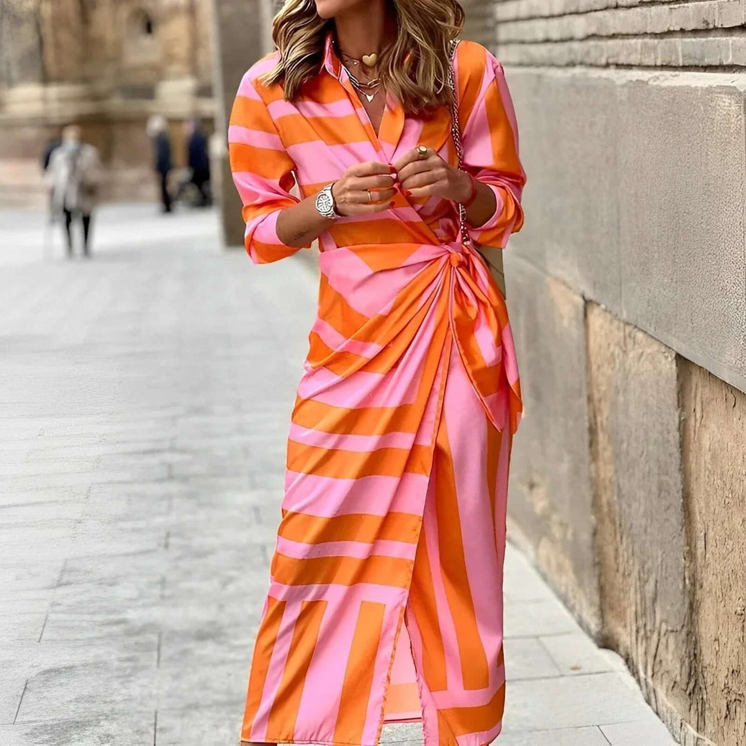 Casual yet elegant women's floral wrap midi dress. Versatile lightweight design, perfect for summer clothing.