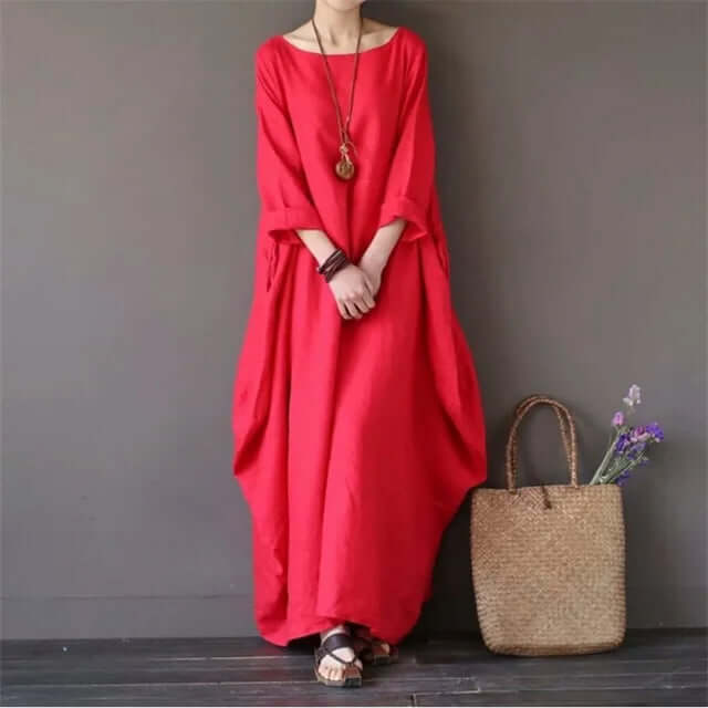 Sophisticated women's flowy maxi dress, a perfect choice for elegant evening events or stylish summer outings.