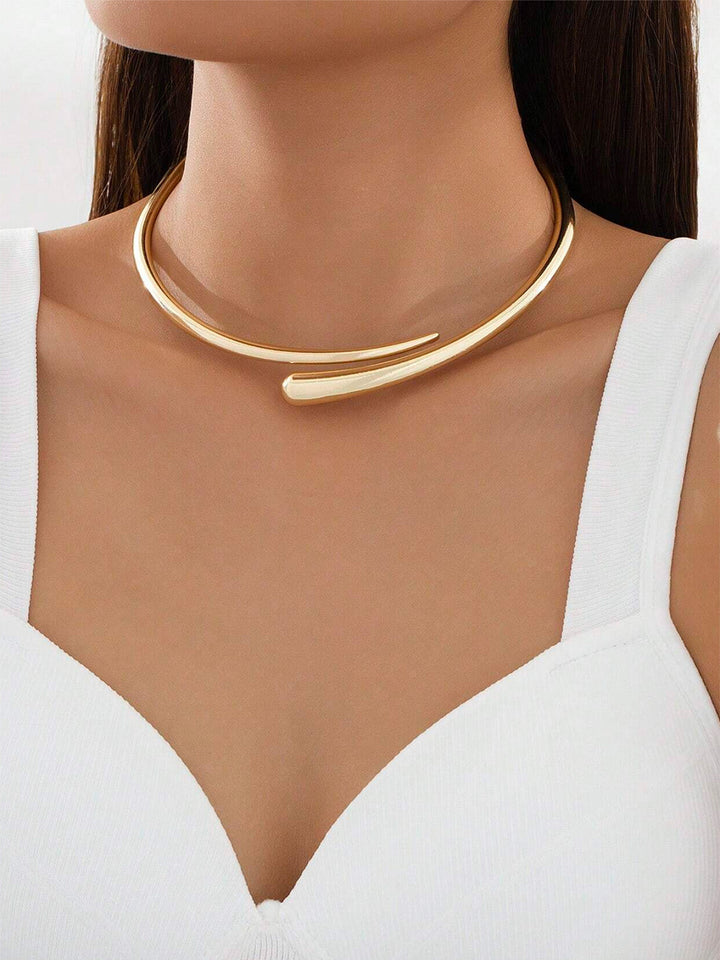 Elegant women's gold water drop open choker necklace, a minimalist fashion statement piece.