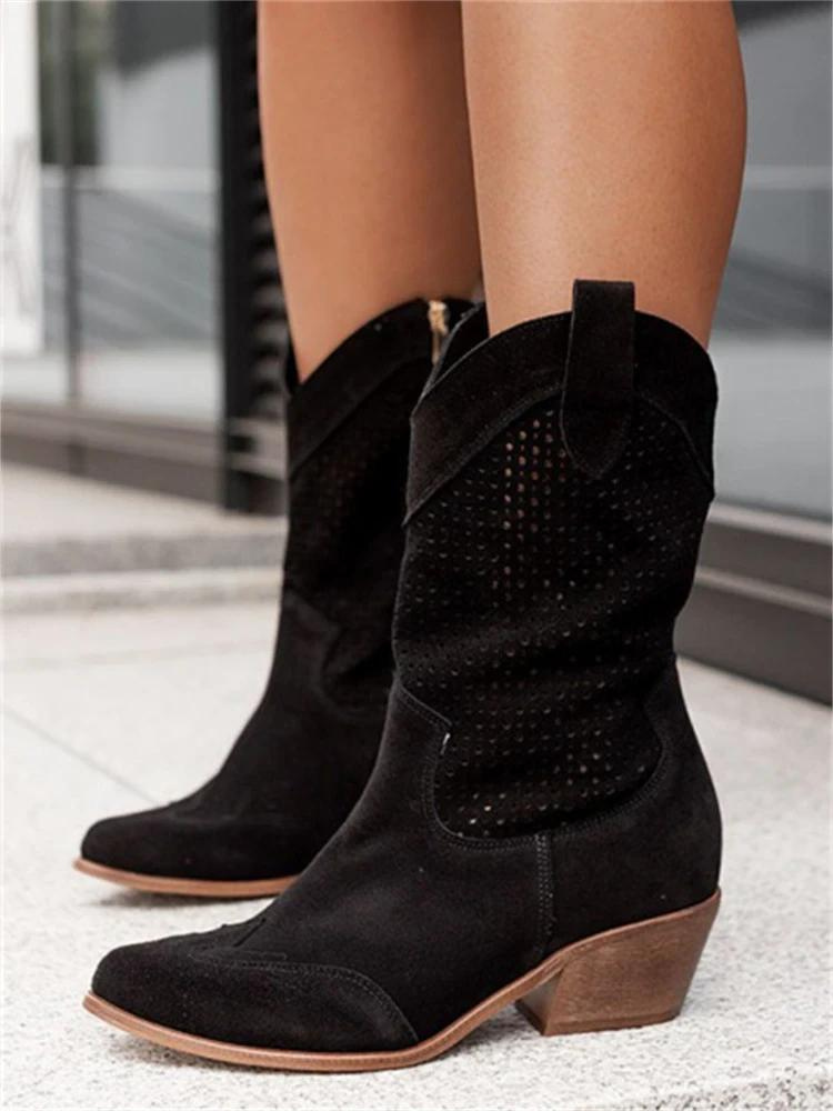 Fashionable women's western boots with elegant block heels. Chic heeled cowgirl boots, ideal for year-round style.