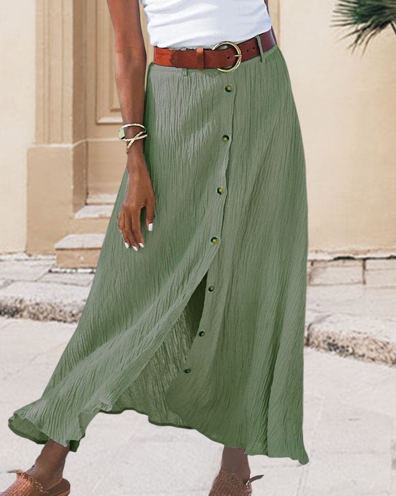 Elegant women's high-waist long skirt in a flowing solid color fabric, perfect for versatile fashion.