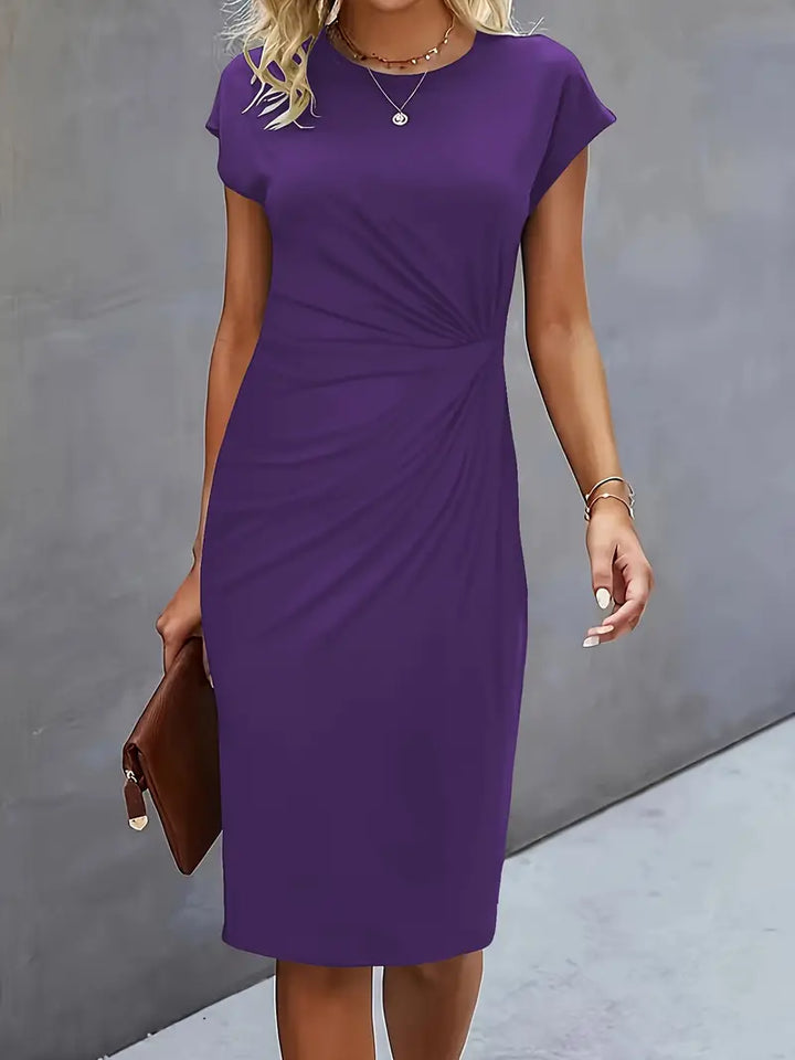 Women's versatile knee-length sheath dress, solid, with an elegant ruched waist for day to night.