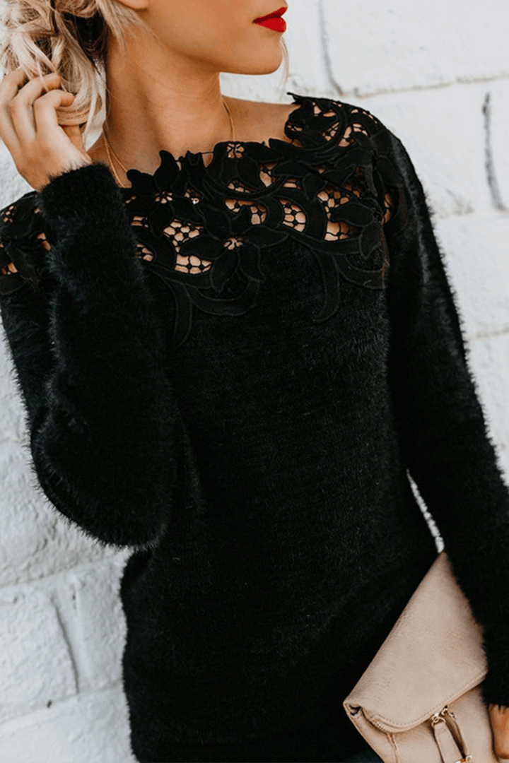Elegant women's knitted sweater top with delicate lace detail, long sleeves, perfect for winter fashion.