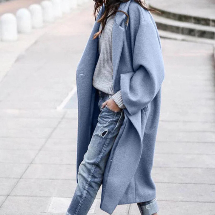 Luxurious long women's trench coat for winter, providing elegant style and warmth in cold weather outerwear.