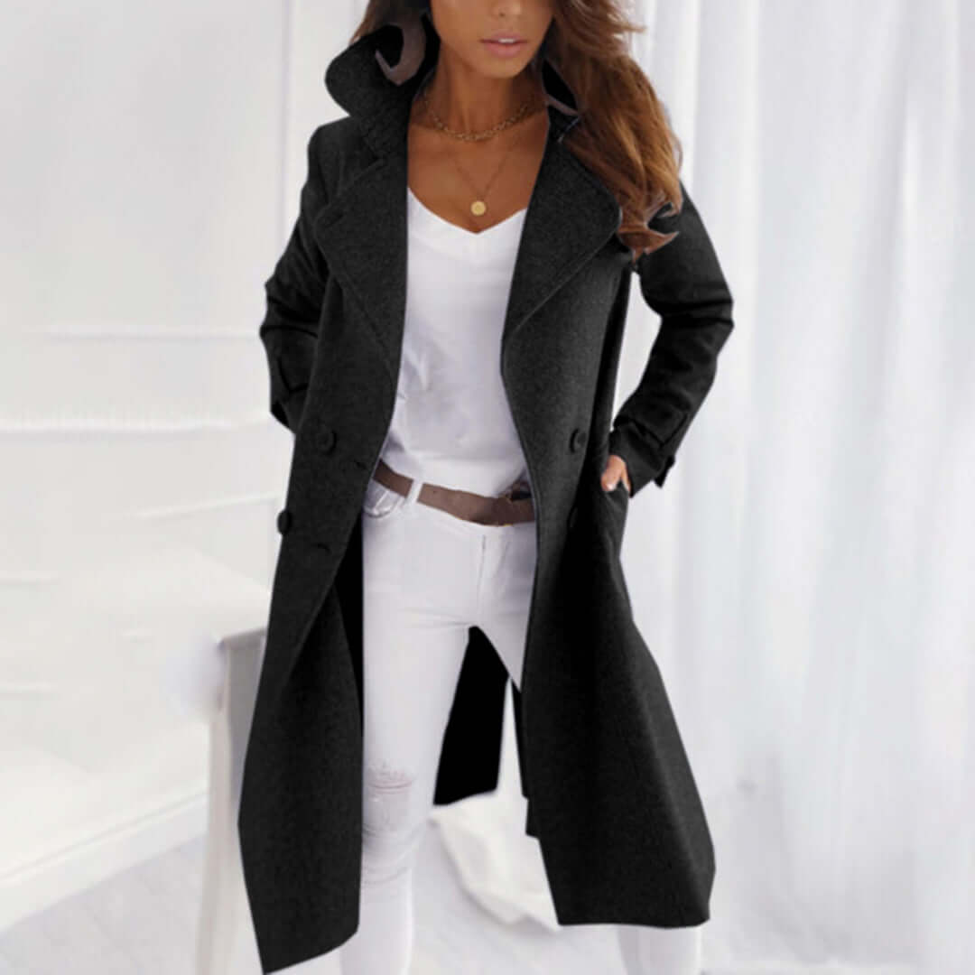 Warm mid-length women's fleece trench coat with lapel collar. A cozy, elegant ladies' winter jacket for daily wear.