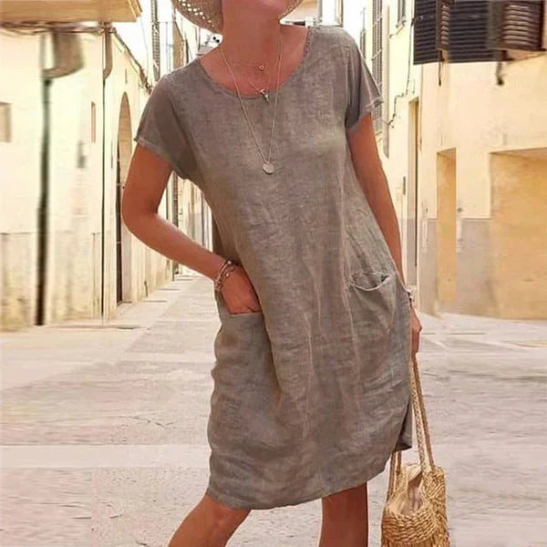 Stylish women's elegant midi dress, flattering cut & tummy control, perfect for a comfortable, confident look.