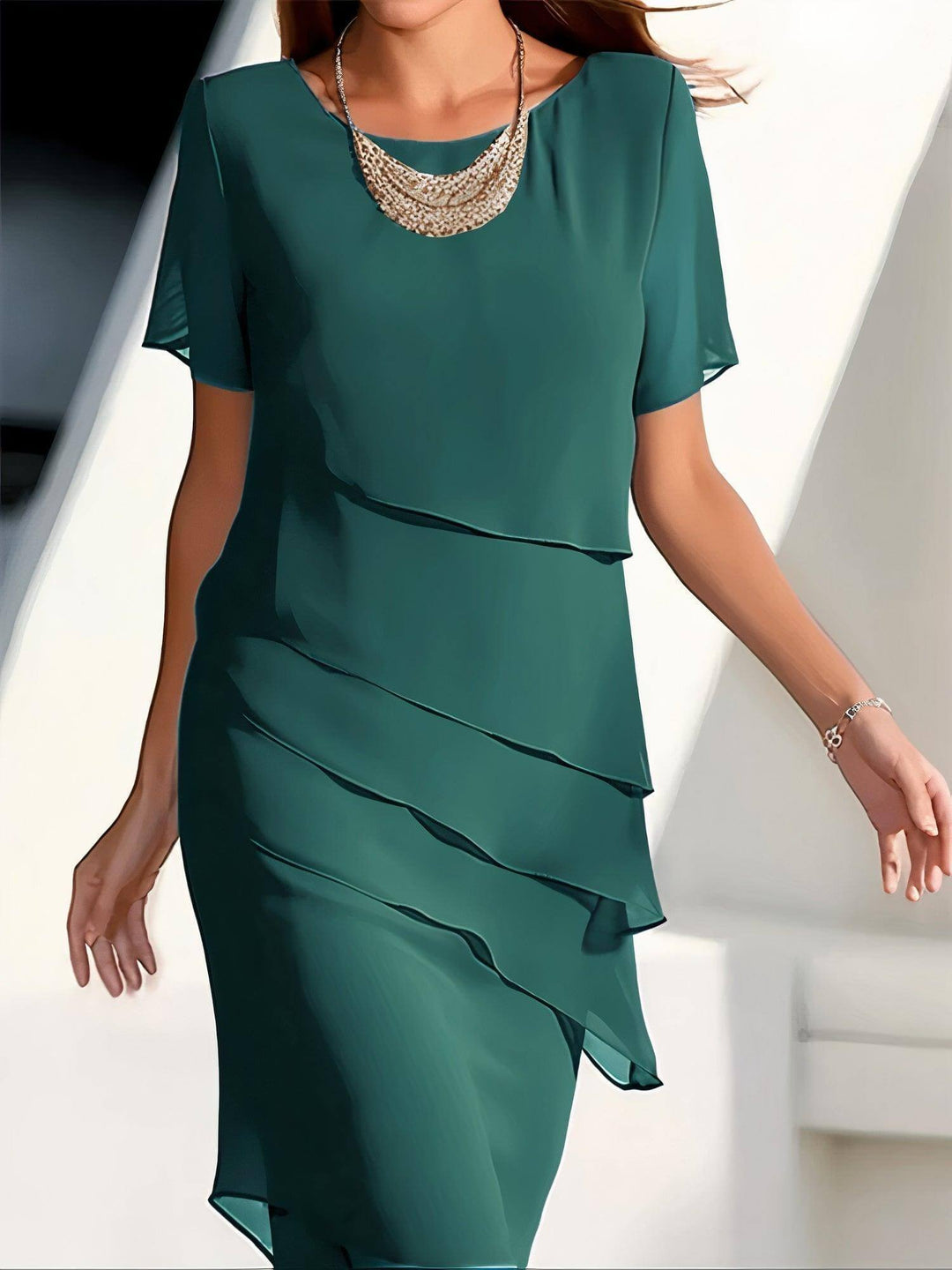 Sophisticated pleated chiffon midi dress for women, an elegant choice for evening wear or special occasions.