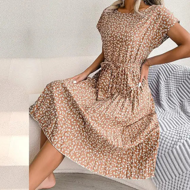 Elegant women's pleated midi dress with short sleeves & waist tie. Versatile for spring & summer.
