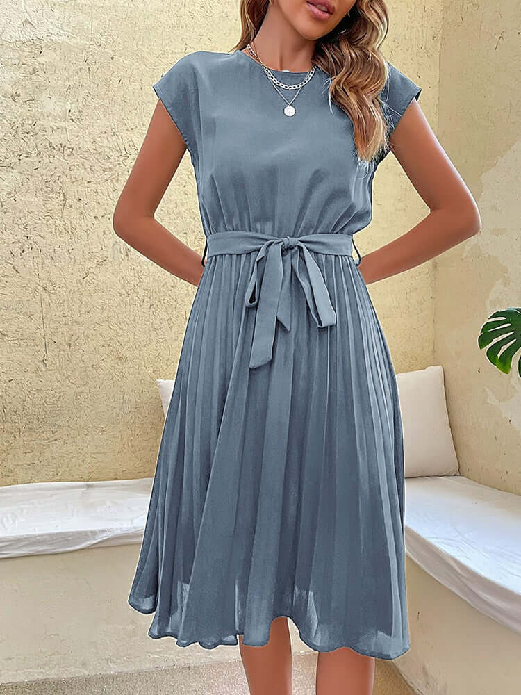 Women's summer pleated dress with comfortable tie waist, round neck and cap sleeves for everyday style.