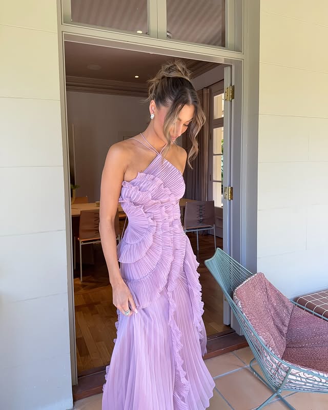 Sophisticated ruffled halter maxi dress, a formal evening gown for women, offering elegant special occasion style.
