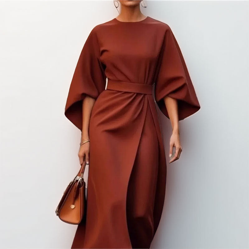 Elegant women's satin maxi dress with flowy batwing sleeves & flattering draped silhouette, perfect for evenings.