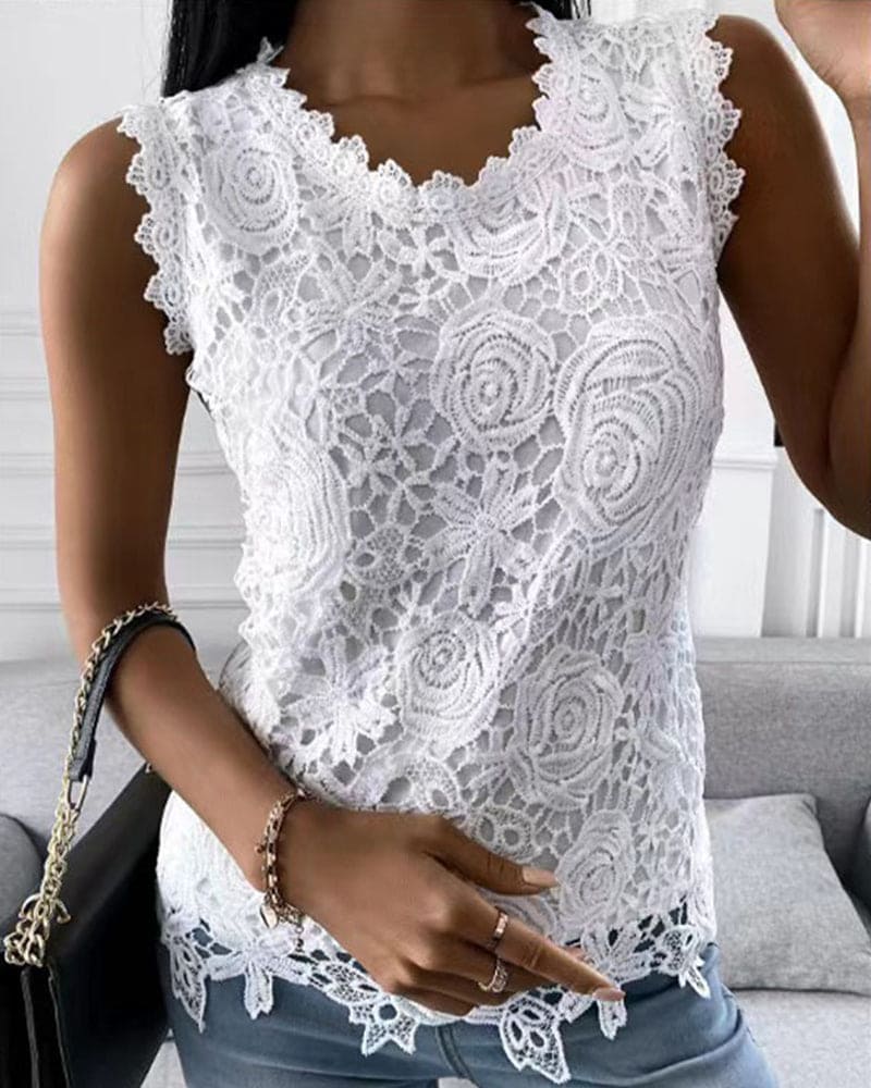 Elegant women's sleeveless lace blouse. Perfect for business casual or chic summer fashion, solid color round neck.