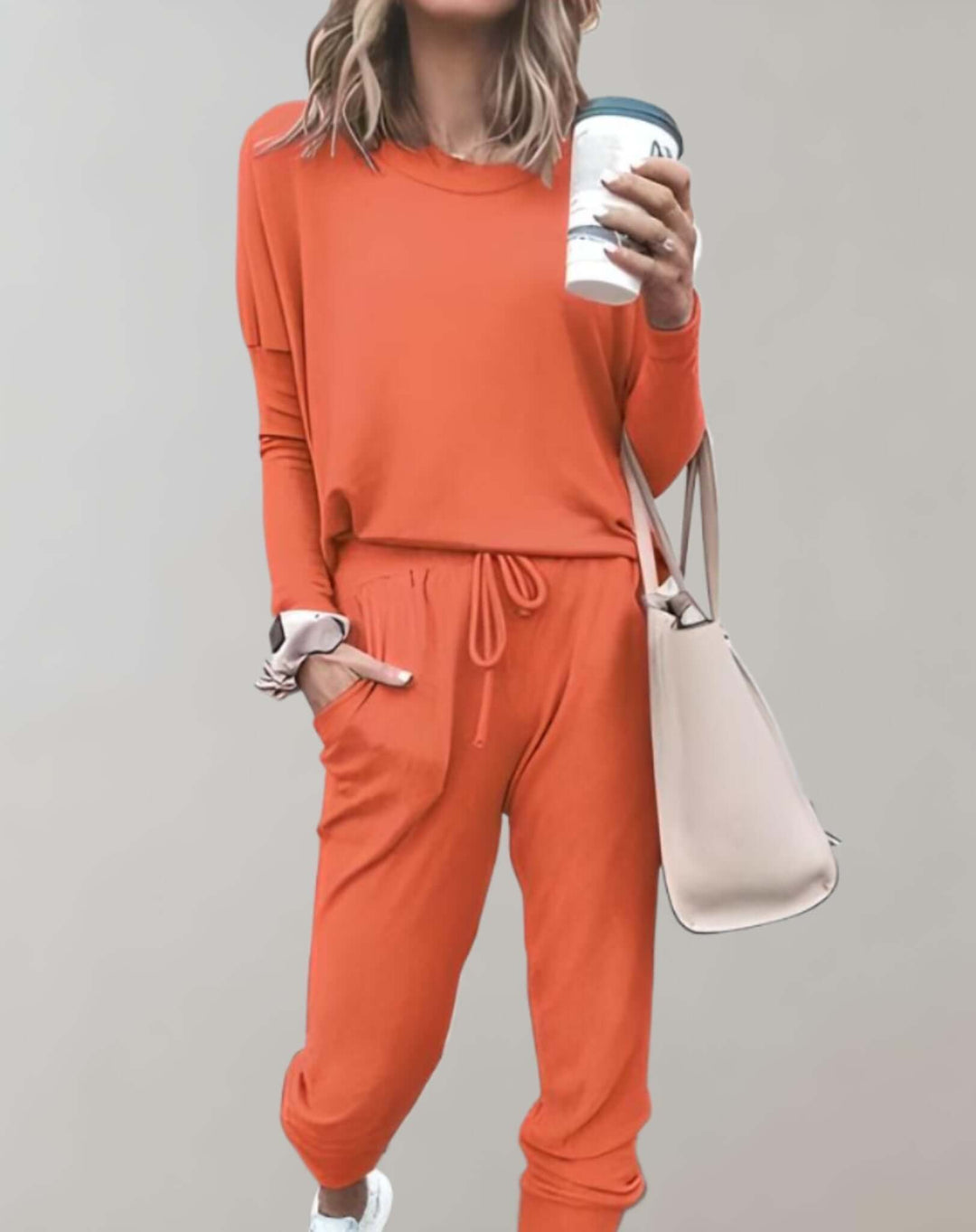 Chic women's tweed two-piece set, exuding elegance for business or special occasions. Autumn fashion.
