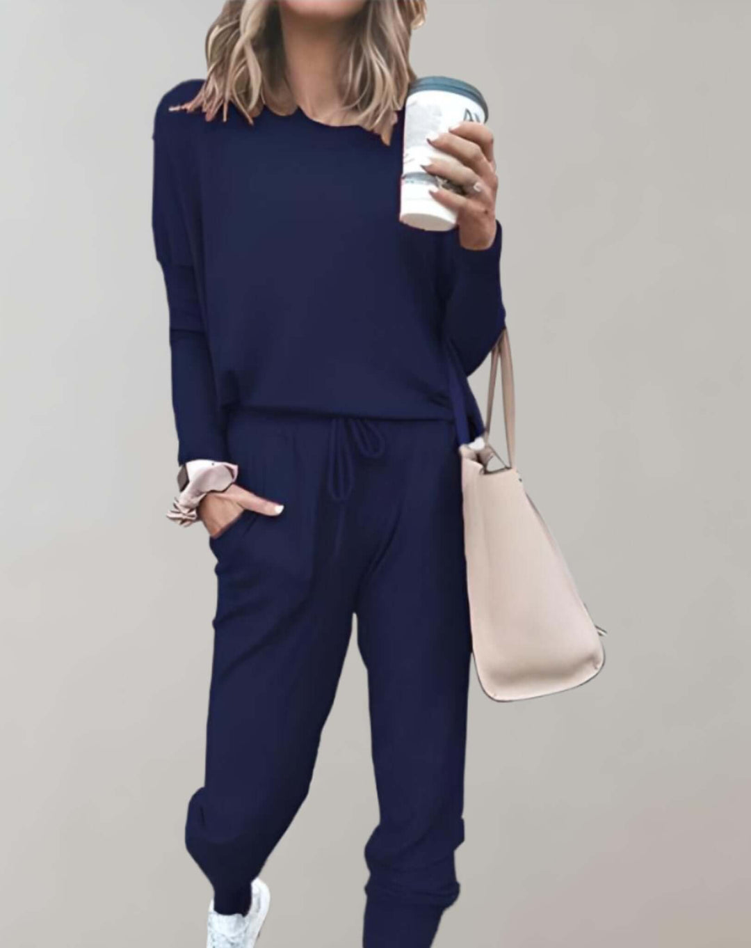 Versatile women's tweed skirt suit set. Elegant two-piece outfit for business casual to formal wear.