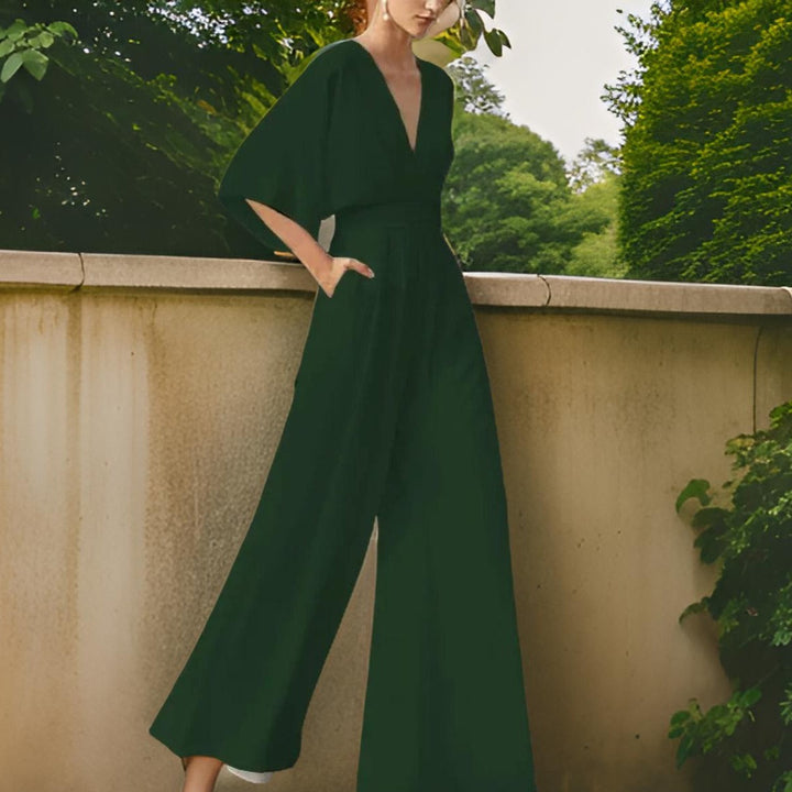 Lightweight women's V-neck jumpsuit with three-quarter sleeves, perfect for stylish & comfortable summer fashion.