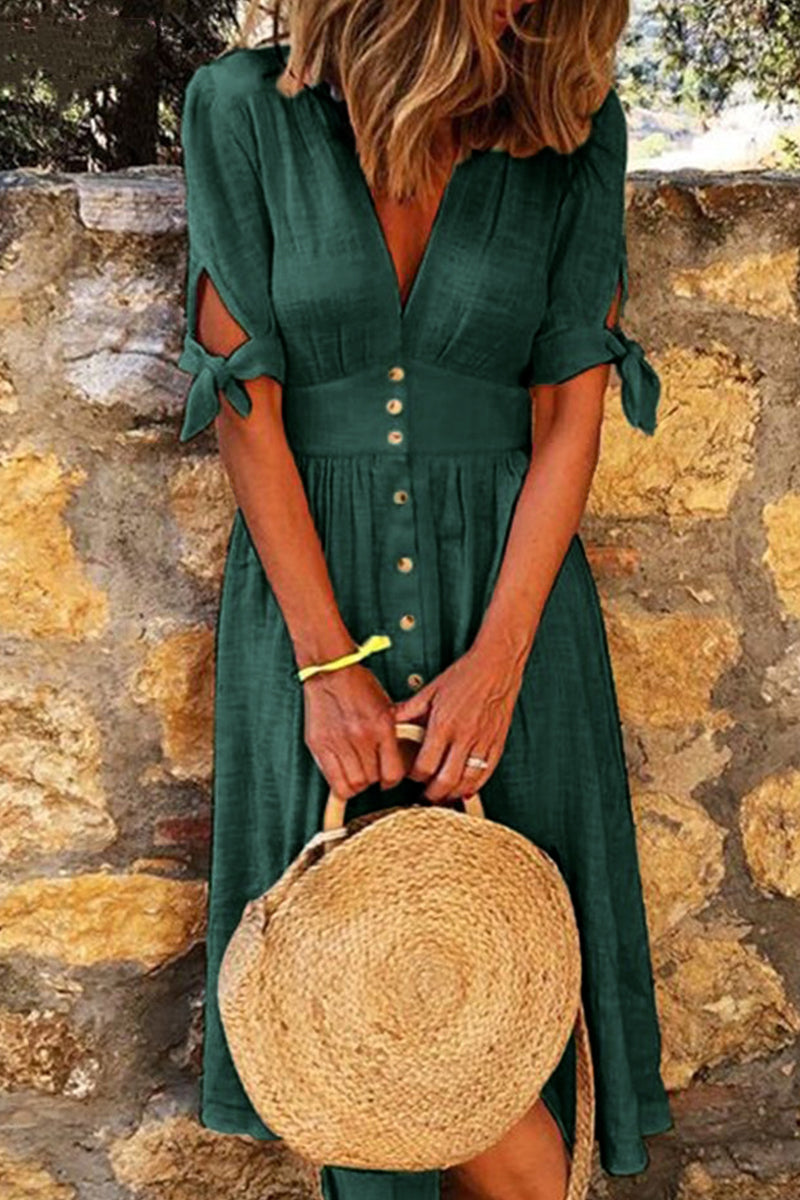 Stylish women's button-down midi dress with a V-neck and short sleeves. Ideal casual or elegant summer outfit.