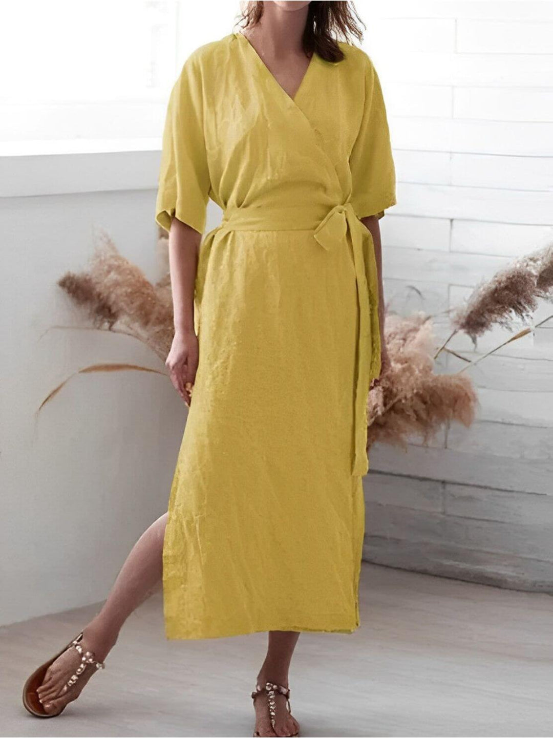 Elegant women's V-neck wrap dress with adjustable belt, perfect for versatile summer fashion and casual wear.