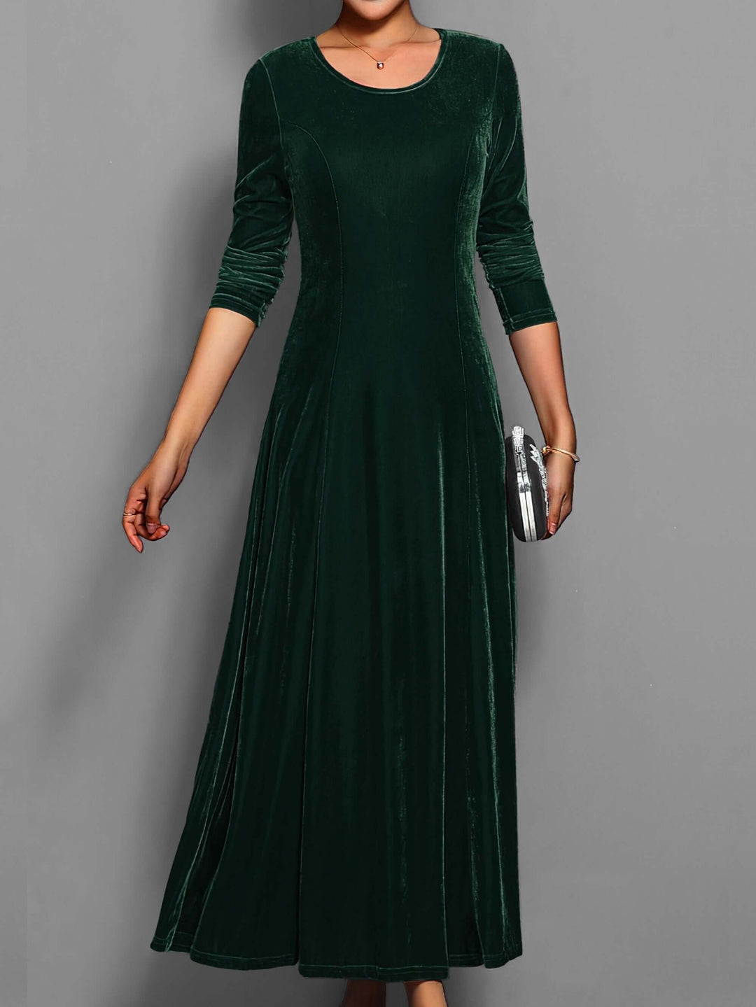 Plush velvet women's midi dress with long sleeves, an elegant and comfortable evening wear option for formal galas.