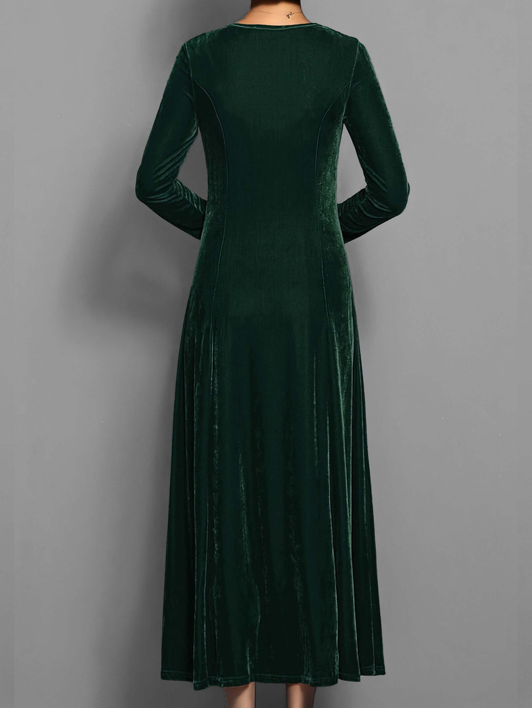 Fashionable women's elegant velvet midi dress with long sleeves, perfect for evening and formal wear.
