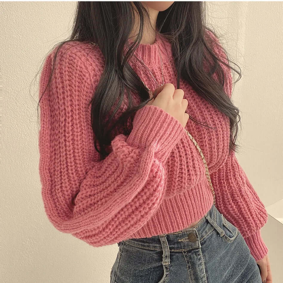 Fashionable women's long sleeve sweater. Elegant and warm for winter casual wear.