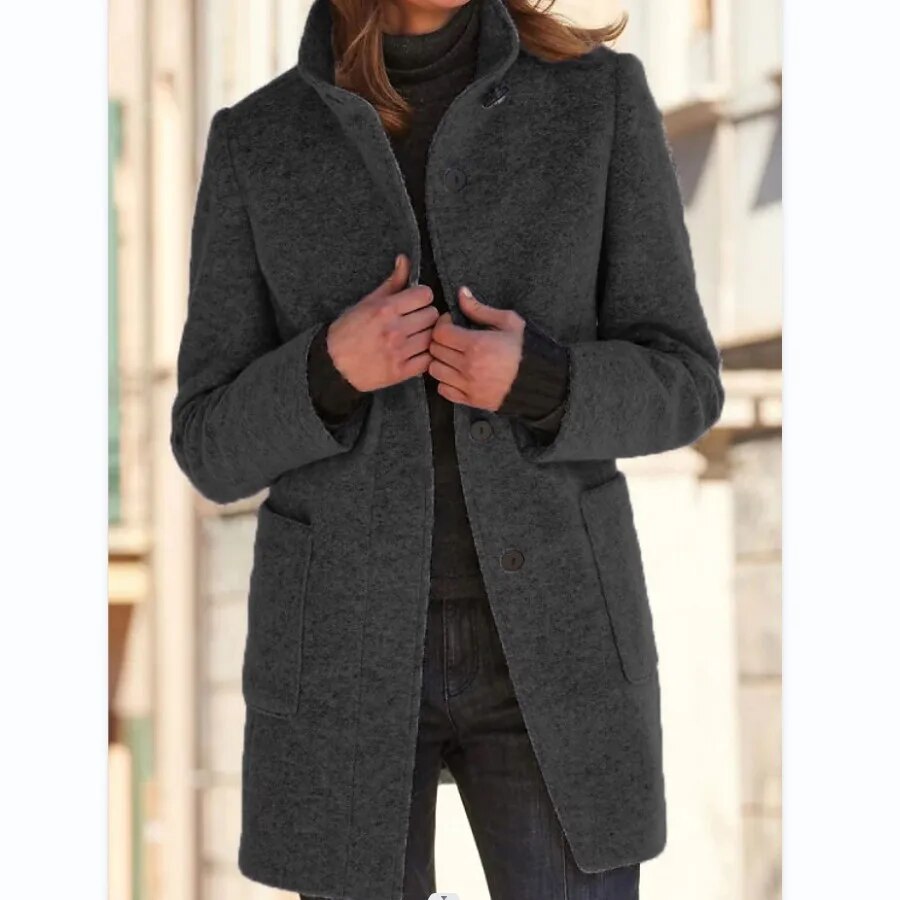 Chic women's long winter overcoat, elegant button design, standing collar, timeless style for cold weather.