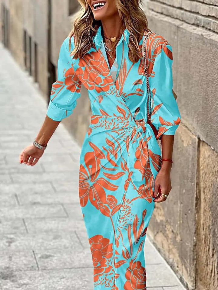 Flattering women's elegant wrap midi dress. Stylish summer fashion for day, evening, or resort wear.