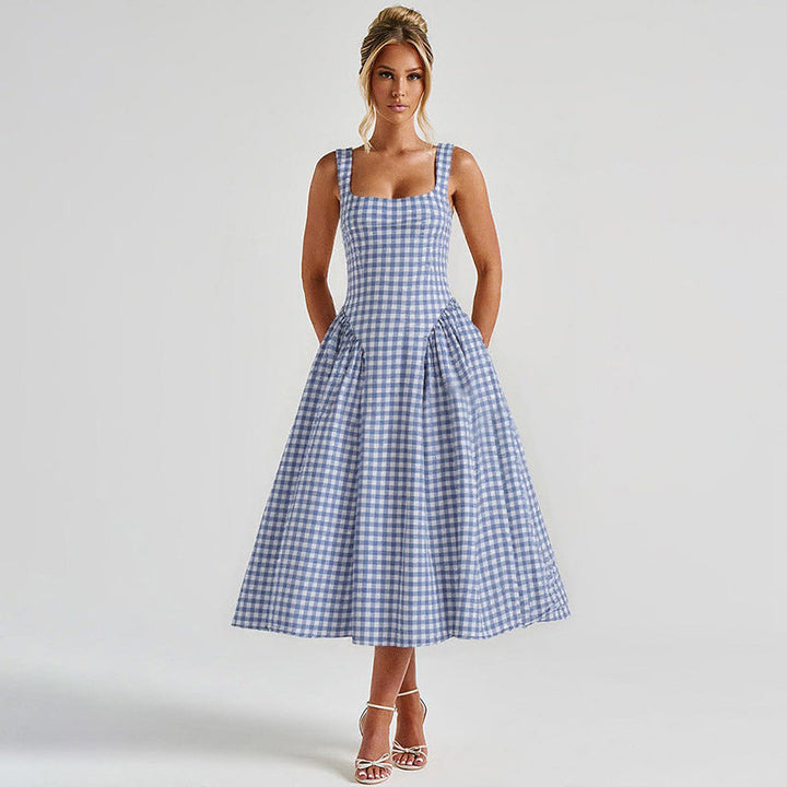 Elegant women's checkered midi dress with square neck and princess silhouette, highlighting classic charm and flattering fit.