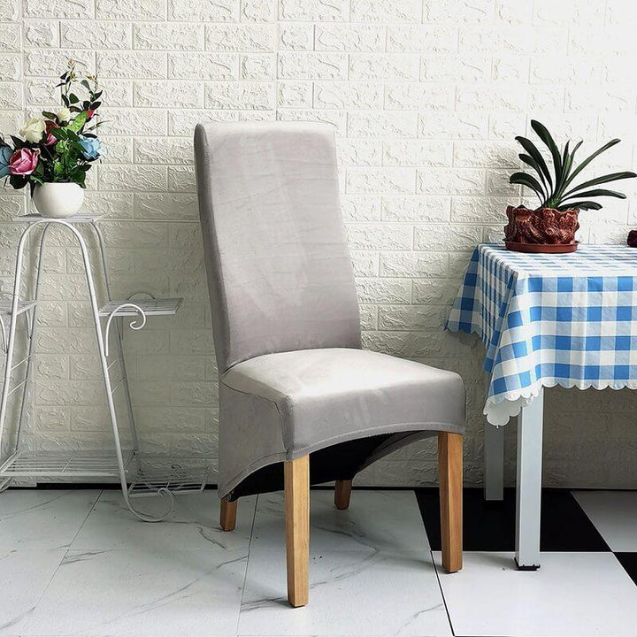 Elegant XL stretch velvet dining chair cover in camel, showcases plush velvet texture, ideal for home or events, fits armless