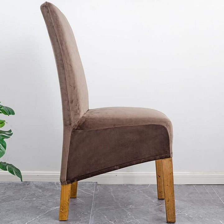 Elegant XL stretch velvet dining chair cover in camel, showcases plush velvet texture, ideal for home or events, fits armless