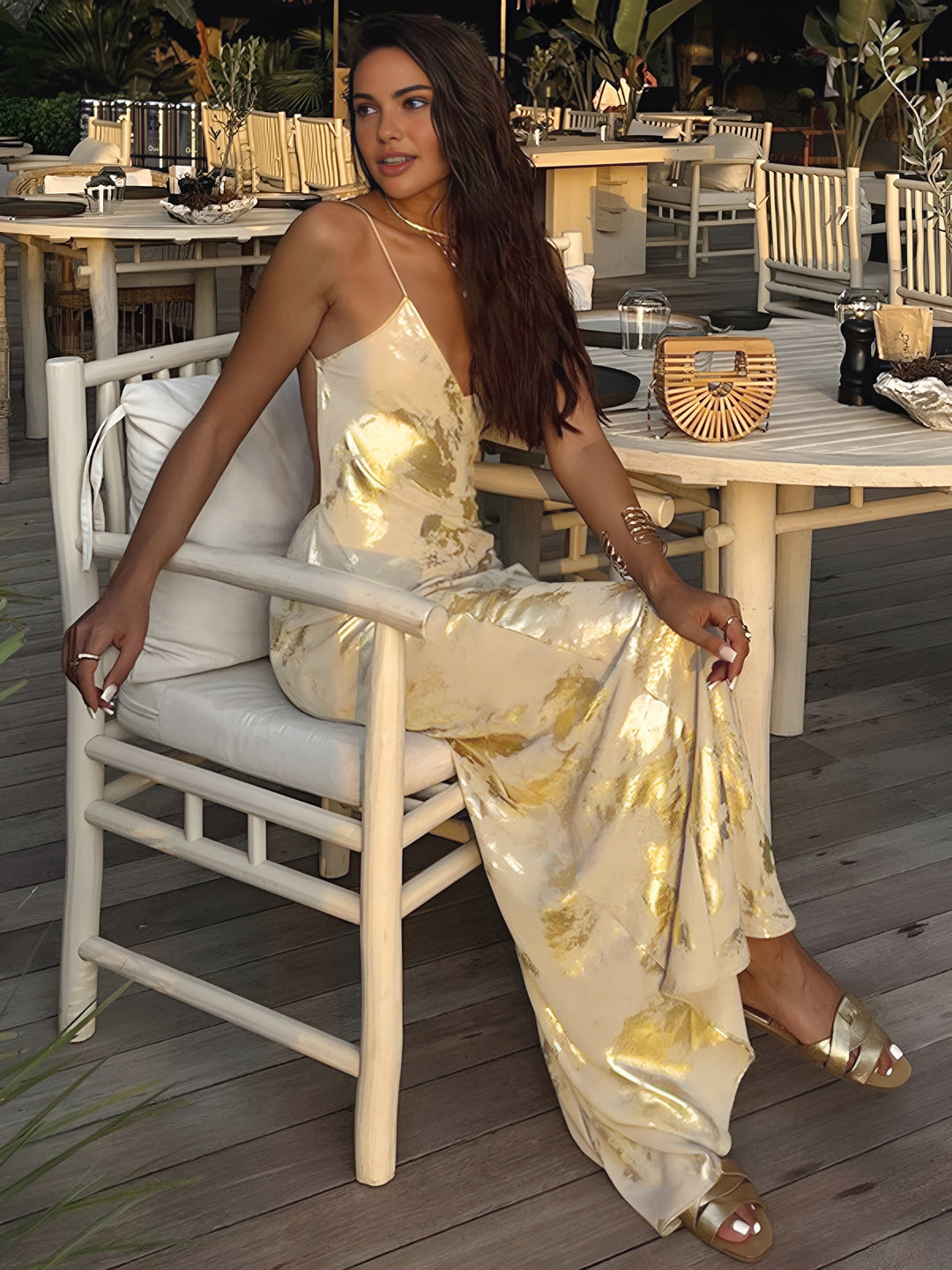 Women's yellow floral wedding guest maxi dress. Elegant slip style, ideal for summer formal events.