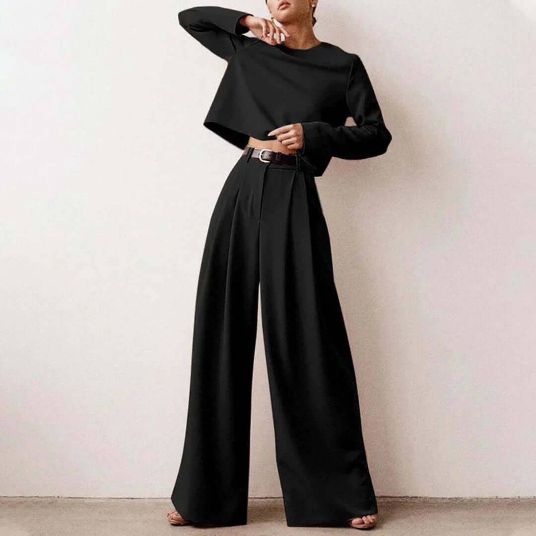 Stylish women's matching two-piece set with flowy top & wide-leg palazzo pants, ideal for summer fashion.