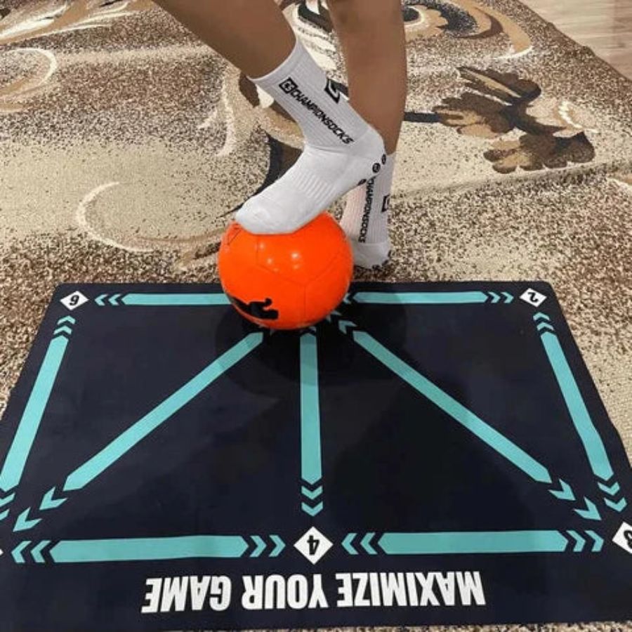 "Football Pro Youth Training Mat for home use, 90cm x 60cm, enhances skills with video program and high-friction surface."