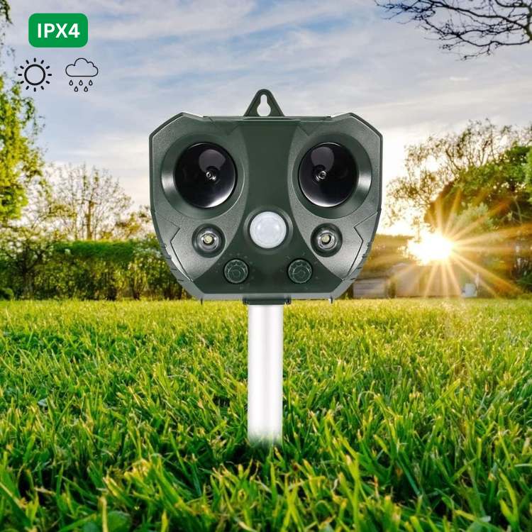 "Green ultrasonic bird and pest repeller device with solar panel, LED lights, and motion sensor for outdoor garden use."