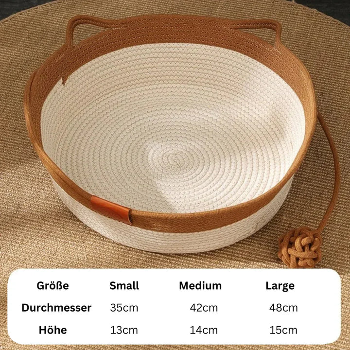 "Handwoven cotton rope cat bed with high sides in neutral tones, offering ultimate comfort and security for cats."