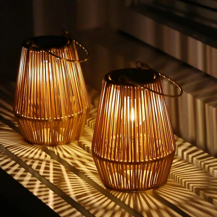 Handwoven solar garden lamp with intricate design, LED light, and waterproof finish, perfect for sustainable outdoor decor.