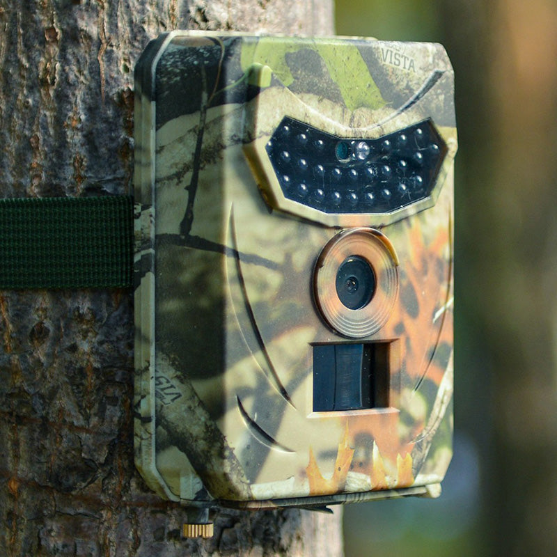 "HD wildlife trail camera with motion detection, captures day/night images; rugged design, compact for outdoor use."