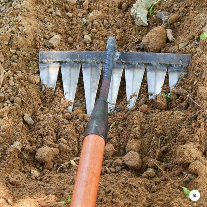 "Heavy-Duty Lawn Rake with stainless steel tines for weeding; angled V-shaped tines, durable garden maintenance tool."