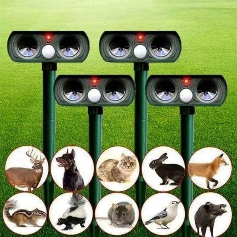 Infrared solar animal repeller with ultrasonic sensor, green device for outdoor garden protection, weatherproof design.