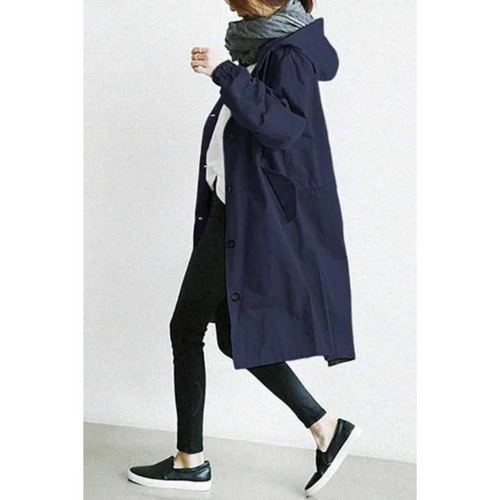 Women's waterproof trench coat with hood, offering all-weather protection and a chic long design.