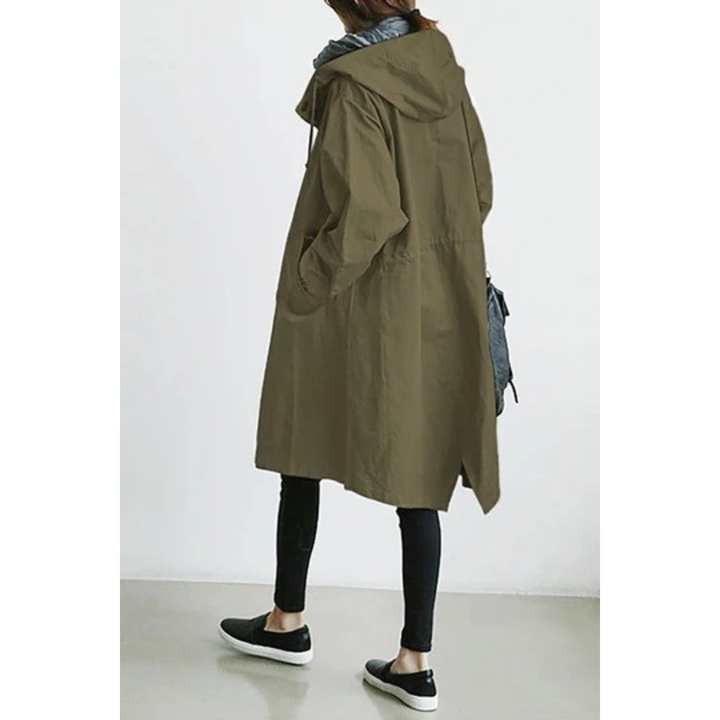 Fashionable Isabelle long hooded rain jacket for women, waterproof and versatile, ideal for cold weather.
